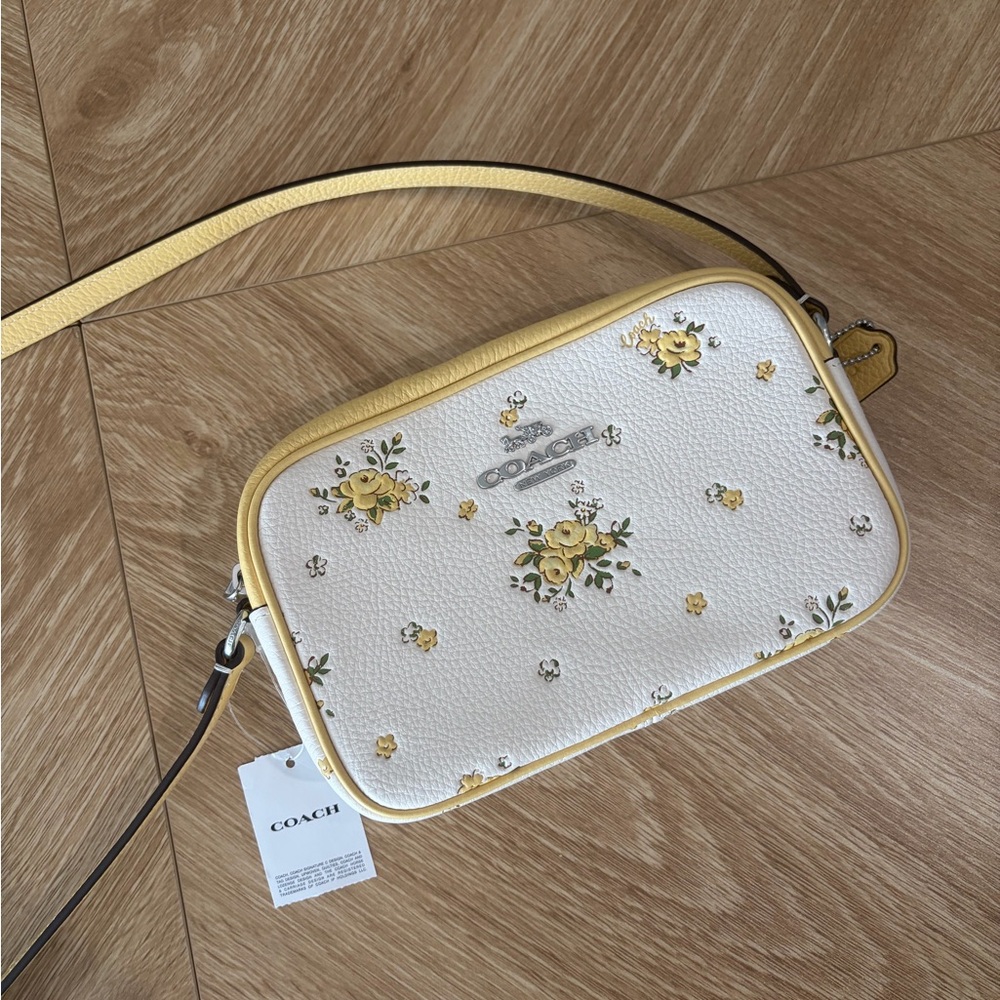 TAG ON: Coach Floral White and Yellow Crossbody Bag